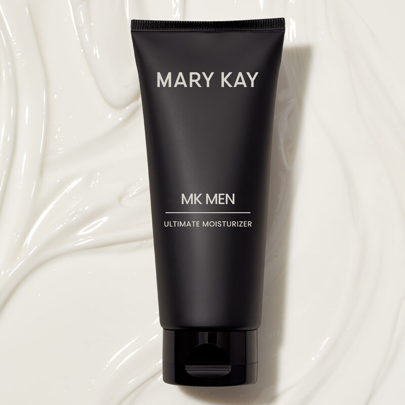 MKMen Ultimate Moisturizer lying on a background of the moisturizer, displaying the smooth texture