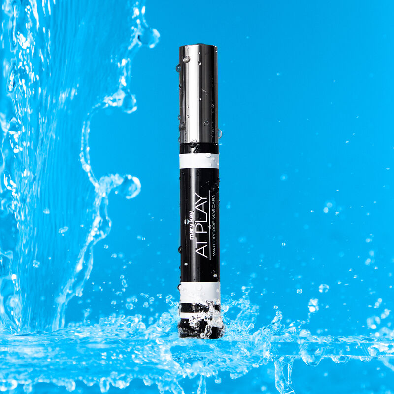 Closed tube of Mary Kay At Play Waterproof Mascara surrounded by splashing water image number null